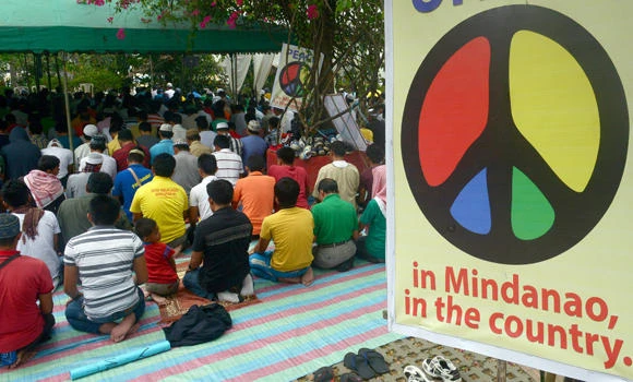 Muslim fighters sign up to vote as Philippines moves to save peace pact