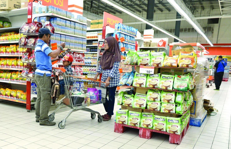 Malaysia launches consumption tax despite public unease