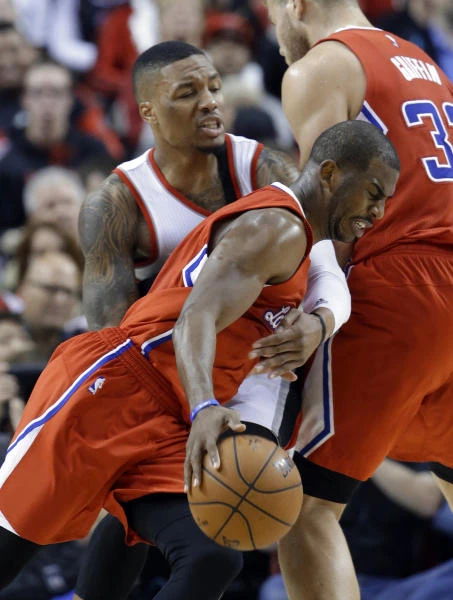 Clippers win 126-122 to keep Blazers waiting for title