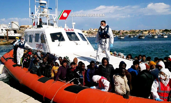 Italy rescues 1,000 boat migrants, sparking right-wing protest