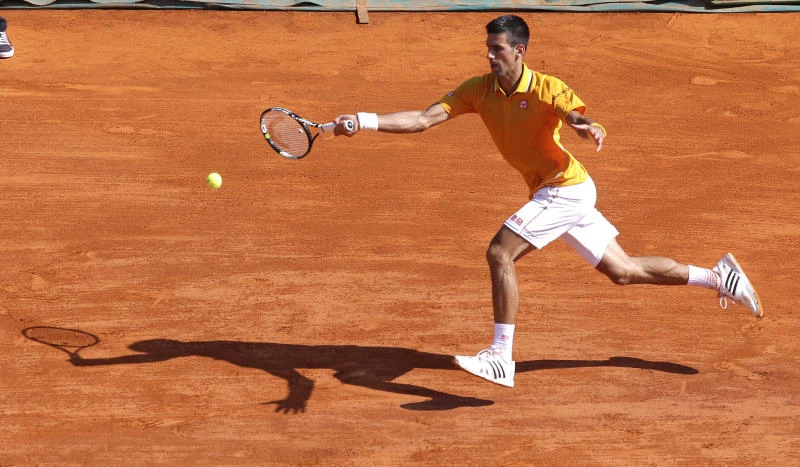 Djokovic off to winning start in clay season opener