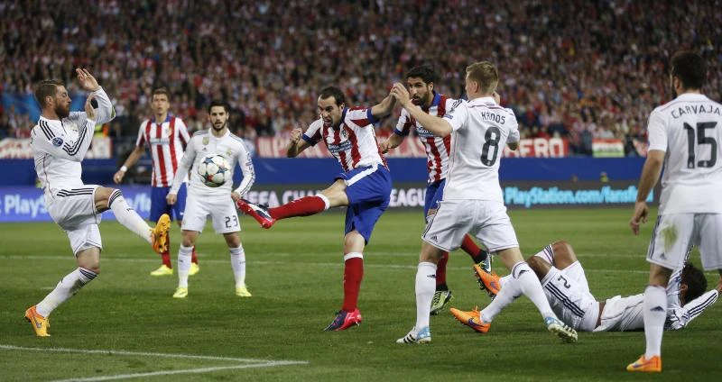 Atletico extends unbeaten run over Real in stalemate