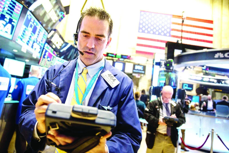 Wall Street: Investors look to earnings for market direction
