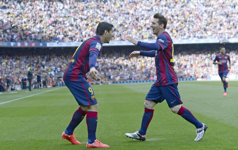 Messi nets 400th goal as Barca edges past Valencia