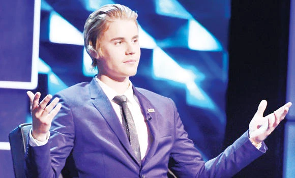 Bieber settles lawsuit with photographer