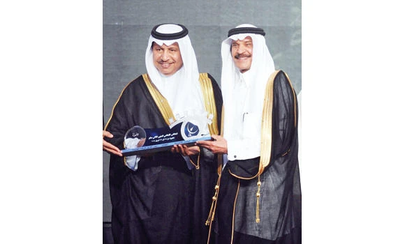 Kuwaiti PM honors veteran Saudi editor Khaled Al-Malik