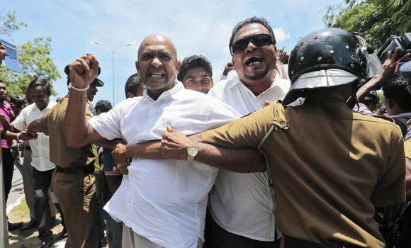 Sri Lanka parliament votes to curb president’s power