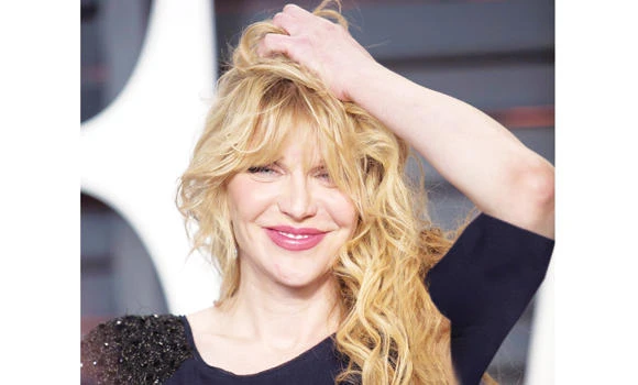 Courtney sued by coauthor of memoir