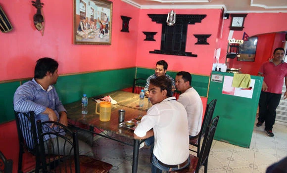 For Nepalese workers in Qatar, quake tragedy hits hard