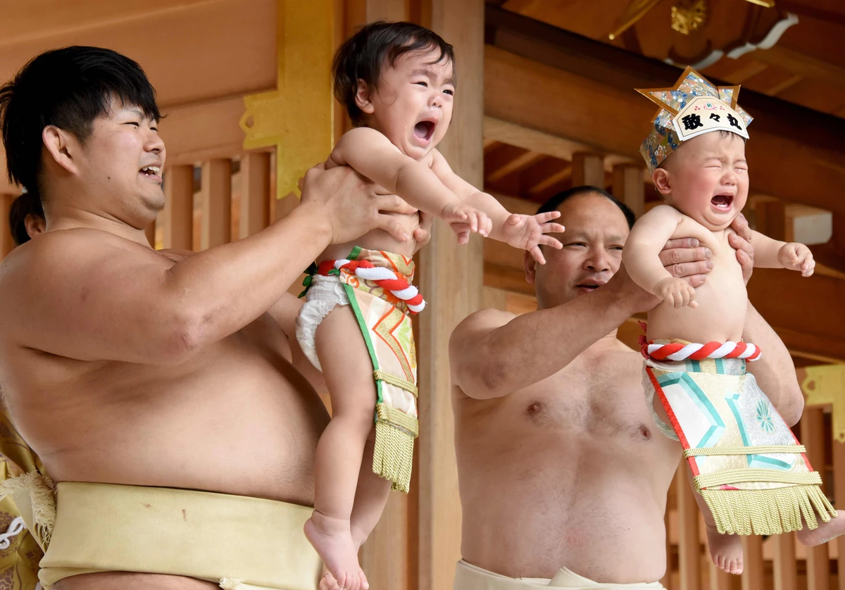 Some 150 babies aged under two took part in the annual baby crying contest in the Shinto shrine in Sagamihara. (AFP)