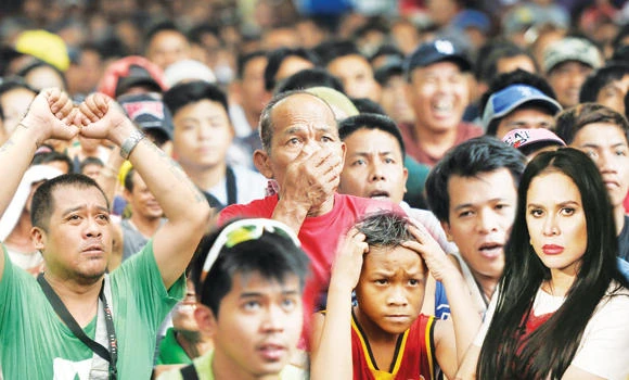 May heat: Manny a tear in Philippines after national icon outboxed