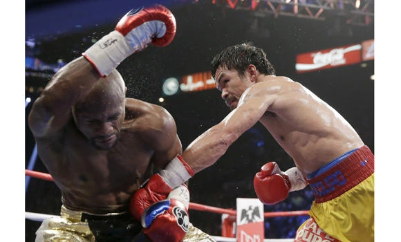 Mayweather beats Pacquiao by decision in richest fight ever