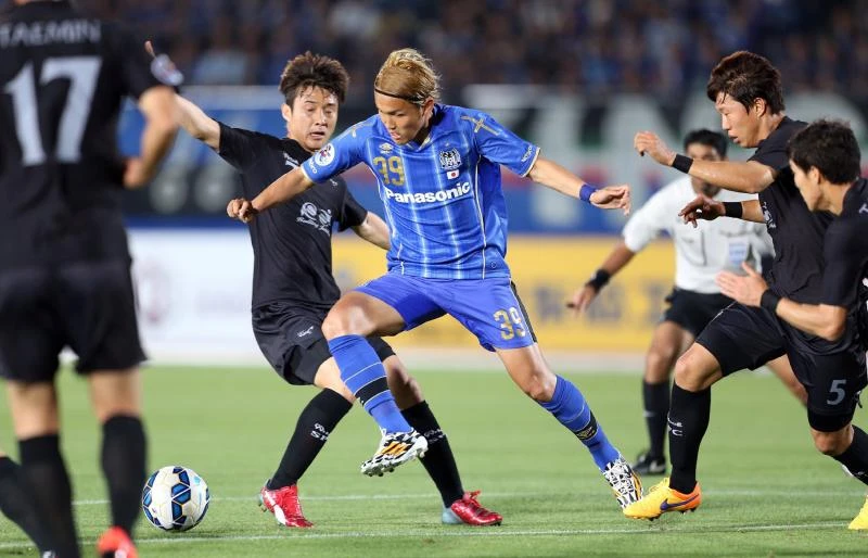 Gamba, Jeonbuk advance to last 16
