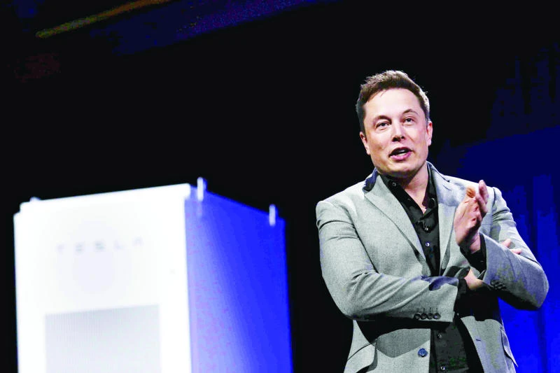 Tesla ramps up output in first quarter but losses rise