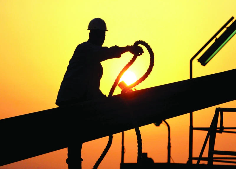 Oil falls, heads for weekly loss as ample supply weighs