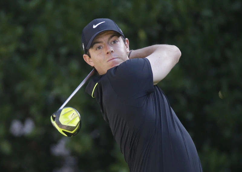 McIlroy two back; Spieth struggles