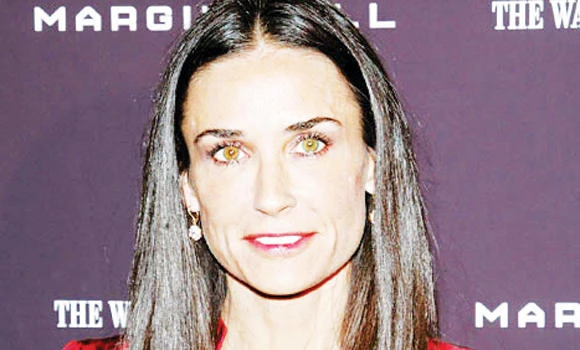 Moore robbed of $200K worth haute couture