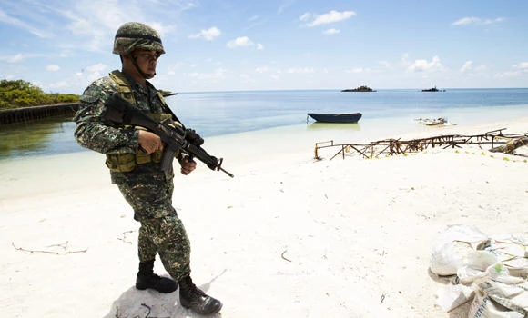 Philippines to turn disputed sea outcrops into tourist draws