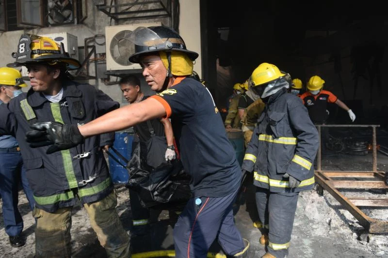Three killed, dozens feared dead in Philippines factory fire