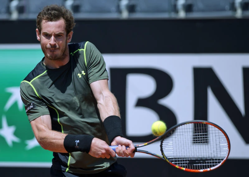 Murray clears first hurdle to stay unbeaten on clay
