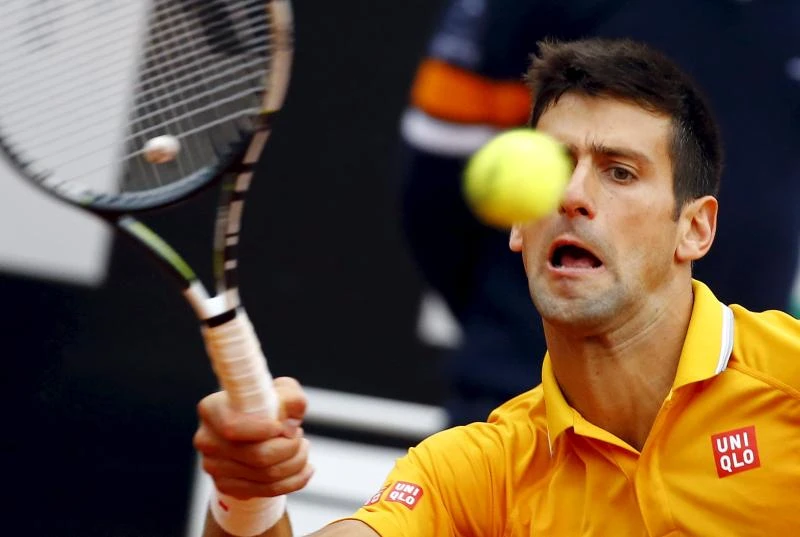 Federer, Djokovic advance to Italian Open semifinals