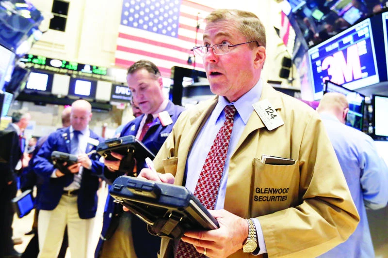 Wall Street slips after weak economic data