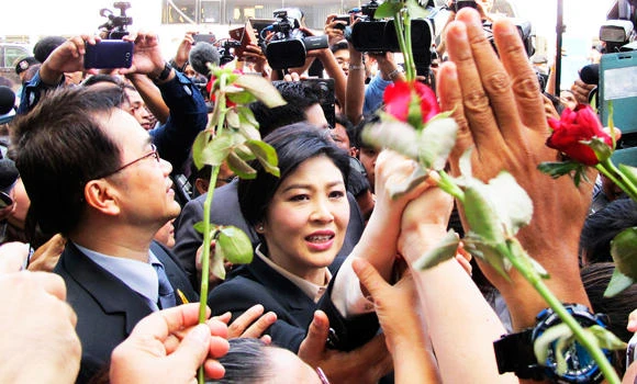 Ousted Thai PM proclaims innocence as trial starts