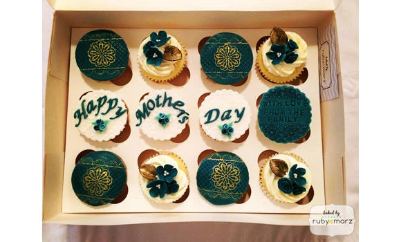 Crumbs, cupcakes and a couple in the kitchen