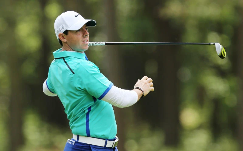 McIlroy opens title defense with frustrating 71