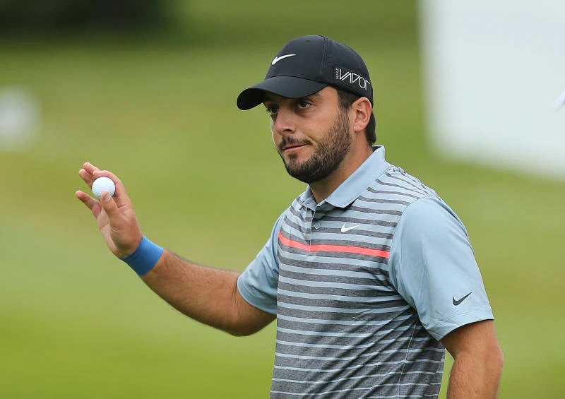Molinari hangs tough to retain lead at Wentworth