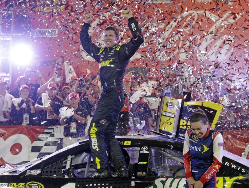 Carl Edwards races to first victory for new JGR team