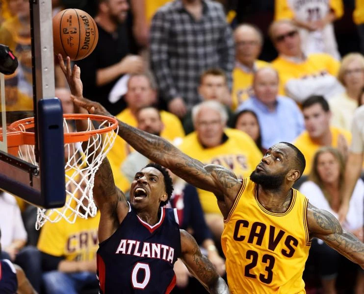 LeBron’s triple-double helps Cavs top Hawks in thriller