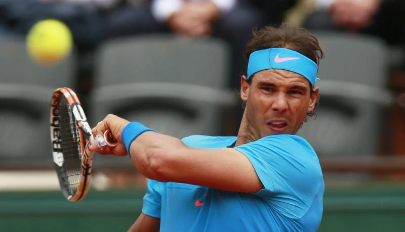 Djokovic, Nadal ease through; Bouchard crashes