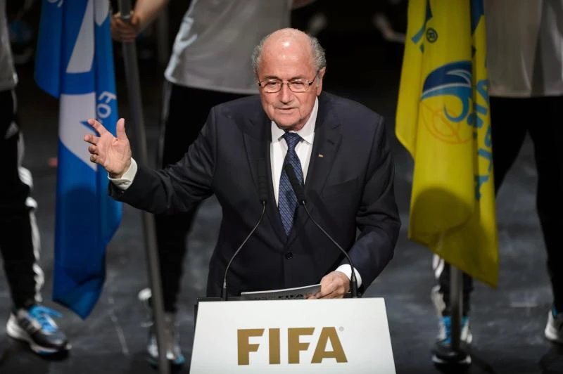 Blatter defies calls to quit as FIFA scandal widens
