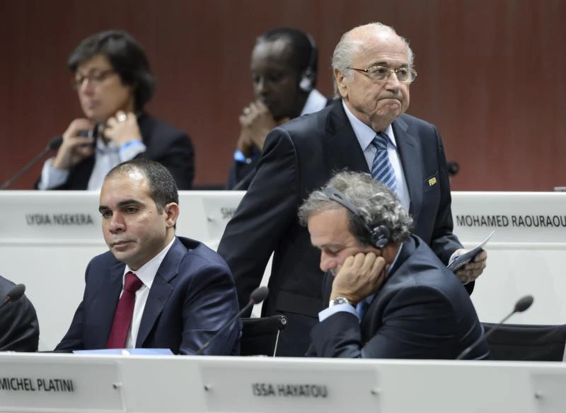 Blatter wins FIFA vote amid corruption storm