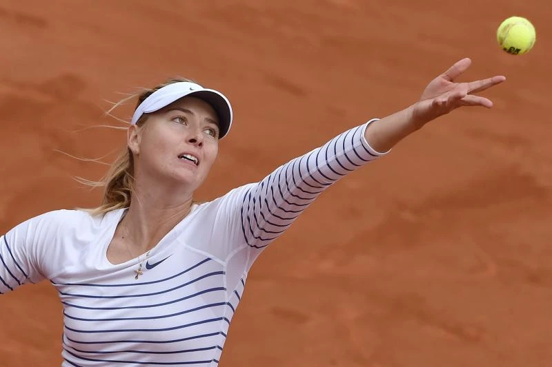 Emotional Sharapova, Ivanovic in last 16