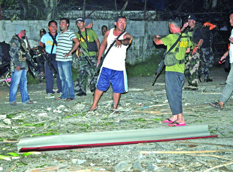 Explosions hurt 15 at Philippine police camp