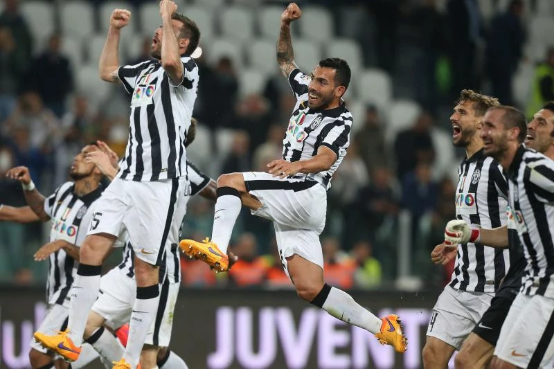 Tevez brace puts Juve within point of fourth successive title