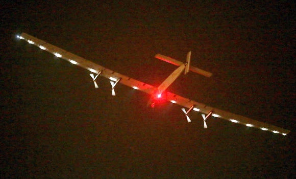 Solar plane lands in Japan to wait out bad weather