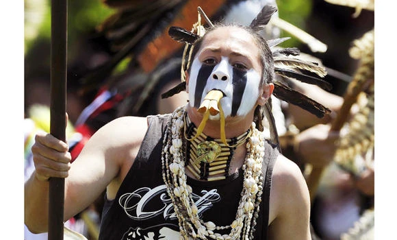 Native American student sues over right to wear feather