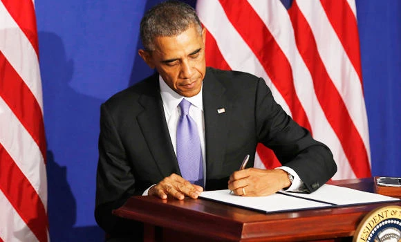 Obama signs new curbs on NSA into law