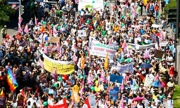 34,000 rally at anti-G7 protest
