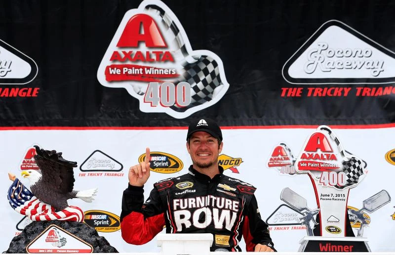 Truex breaks through at Pocono for 1st win since 2013