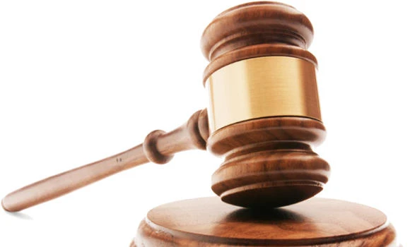 Verdict on former minister charged with seizing land in August