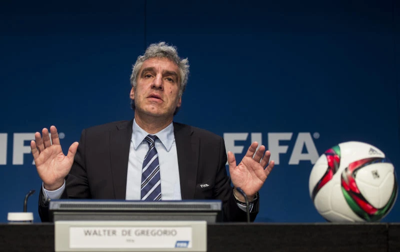 Top official leaves FIFA as EU urges Blatter to go now