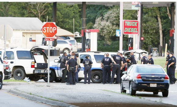 Sniper shoots suspect in Dallas police HQ attack