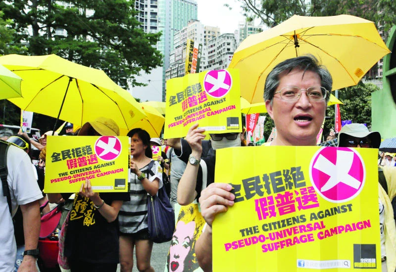 Hong Kong protesters march as key vote looms