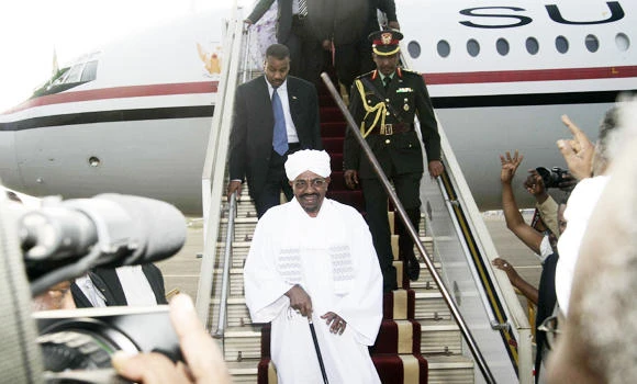 Unruffled Bashir back in Khartoum from S. Africa