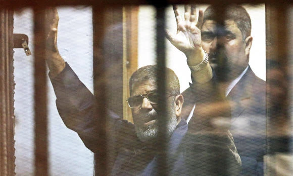 Death verdict blow to MB: Mursi stays defiant