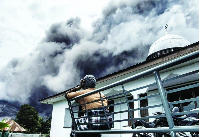 Thousands of Indonesians refuse to leave volcano danger zone